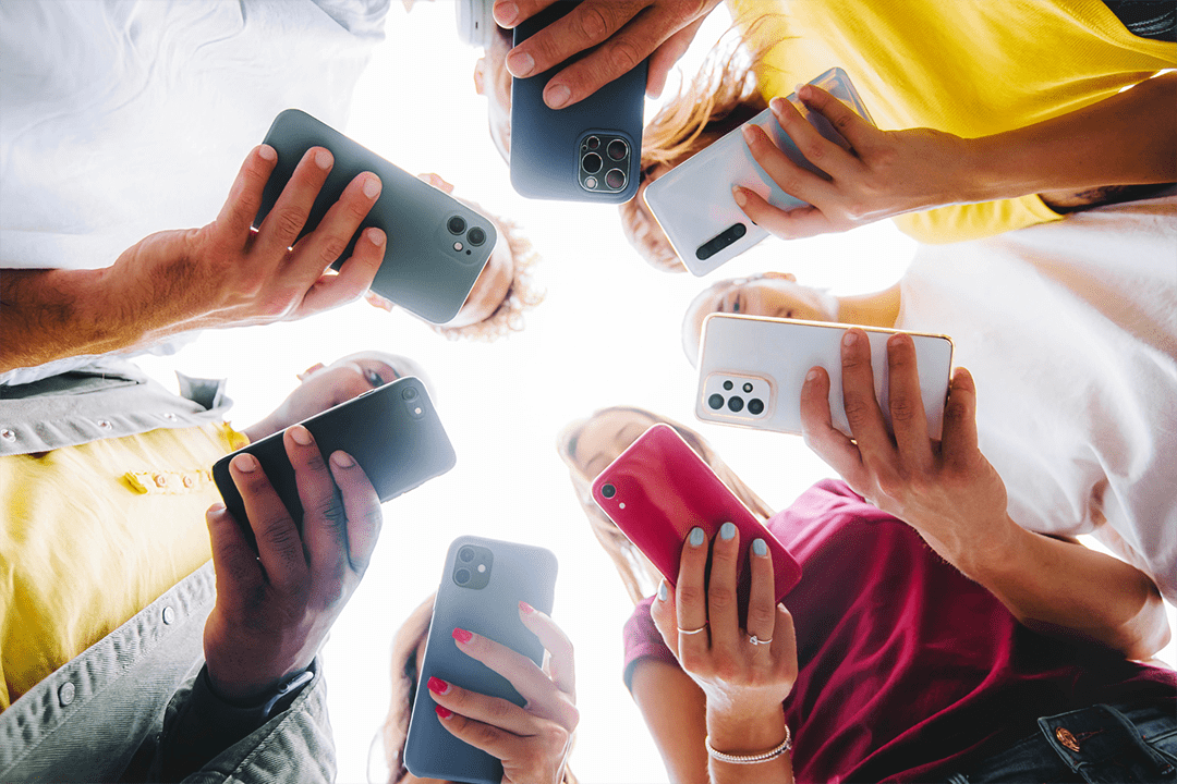 Group of teens using social media